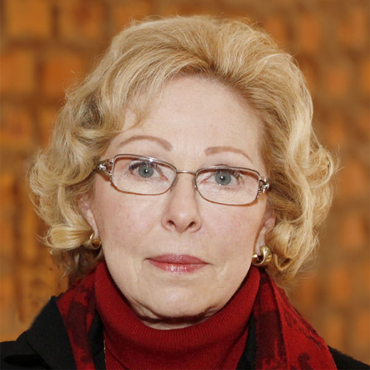 Portrait of Nancy Heigl, highlighting her role in founding the Jason Heigl Foundation.